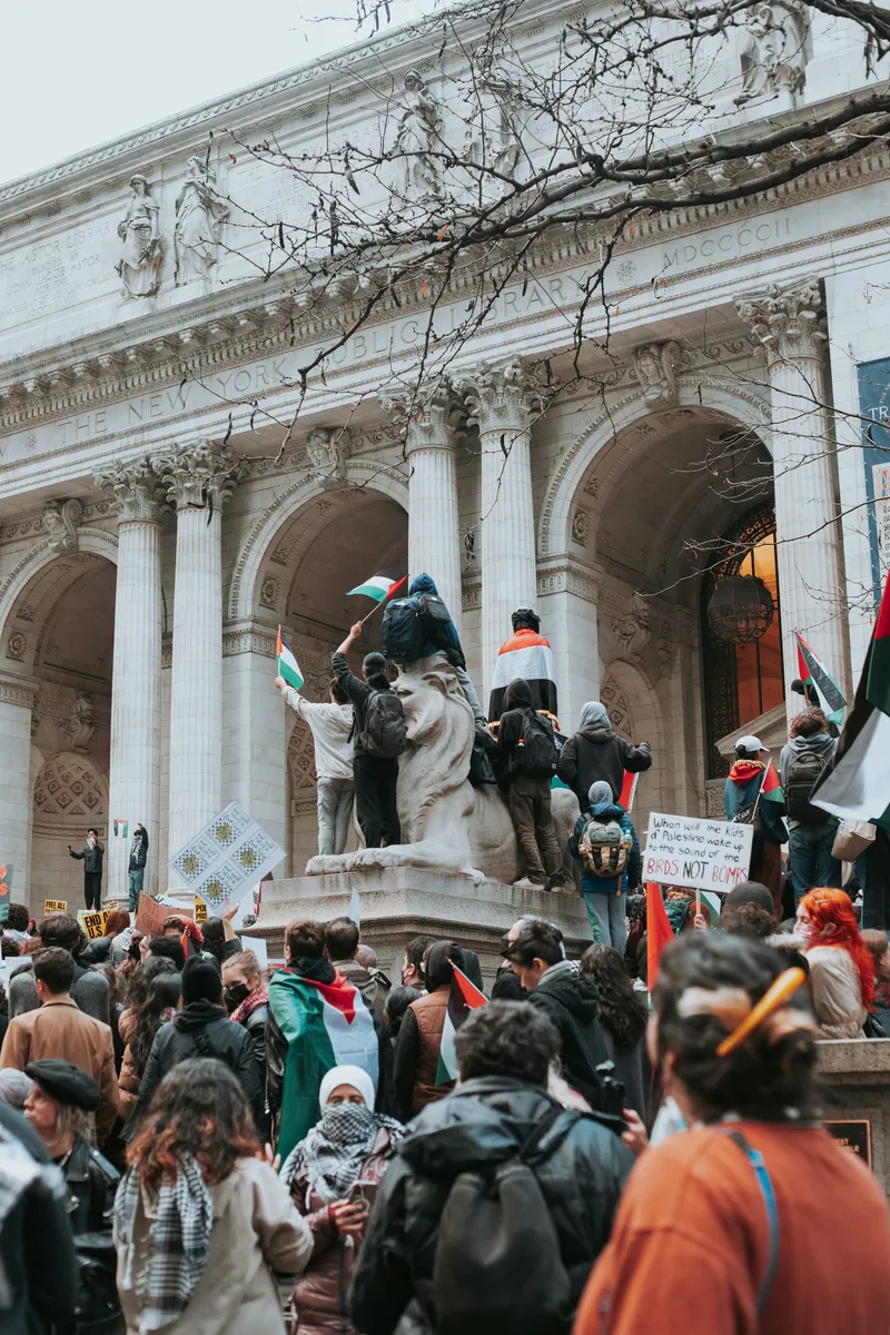 Pro-Palestine protest outside a neoclassical government building